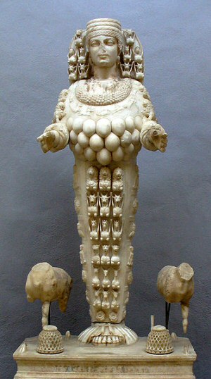 ornate stone statue of a fertility goddess