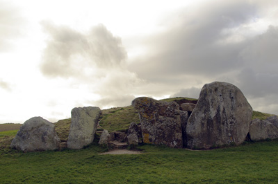 megalithic stones against a dazzling sky